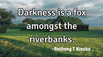 Darkness is a fox amongst the riverbanks.